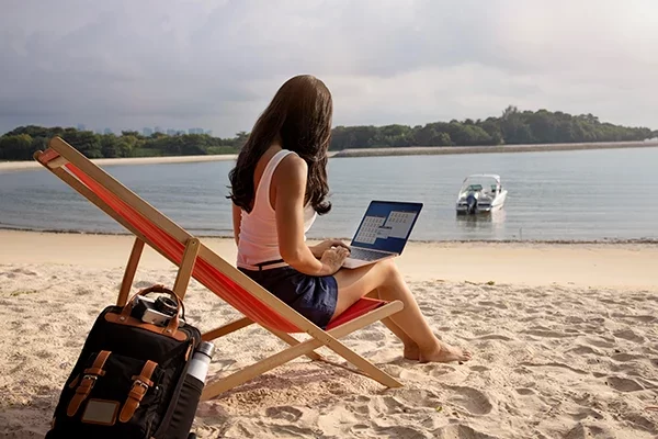 full-shot-woman-working-laptop